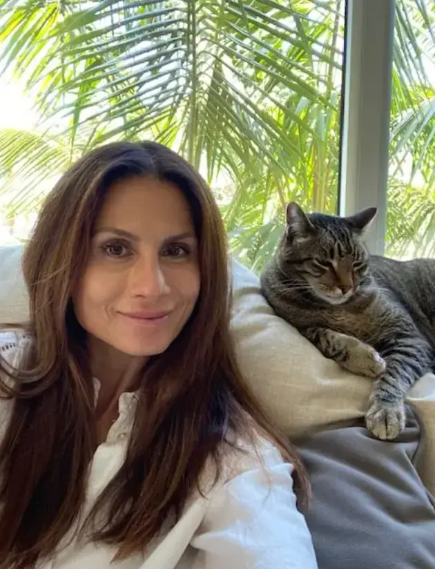 Dr. Melissa Zukle, veterinarian at Hawaiian Gardens Animal Hospital, posing with her cat.